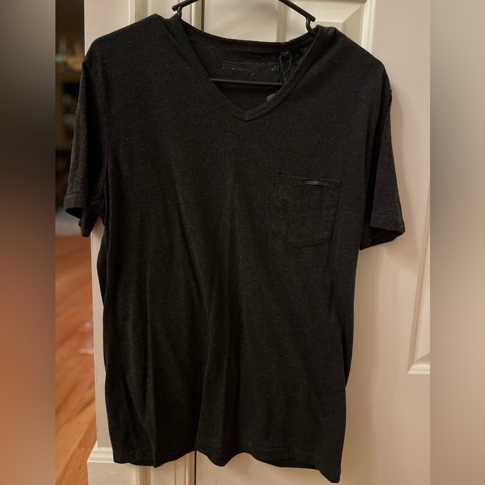 NWT Men’s William Rast Black Tshirt w/ front pocket Size small